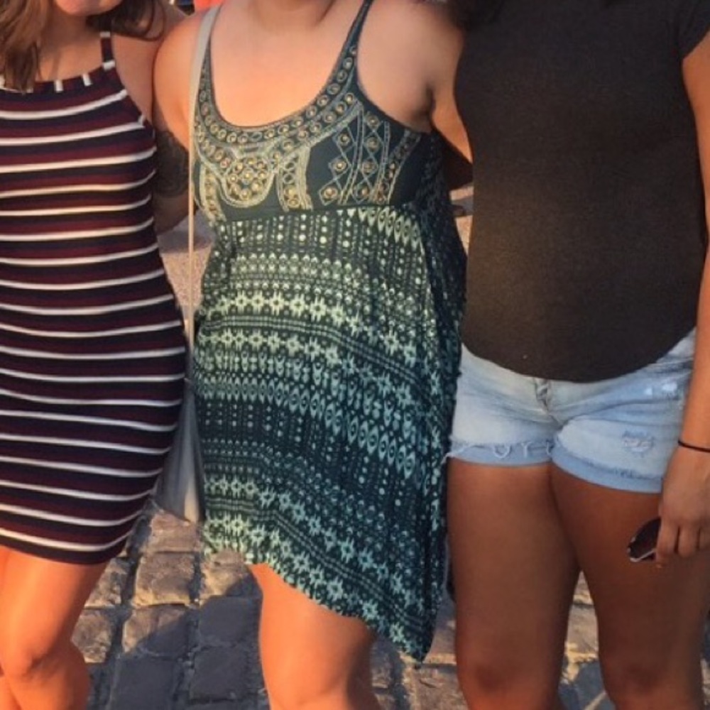 Teal and Gold dress from Downtown Disney